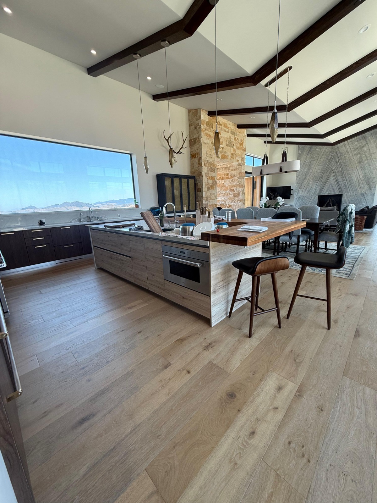Custom kitchen with exposed wood beams